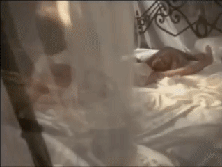 Victoria-Silvstedt-white-lingerie-in-bed.gif
